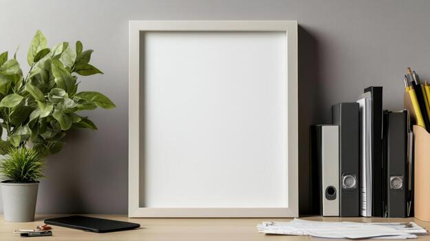 minimalist frame with blank interior on desk with plants and folders photo
