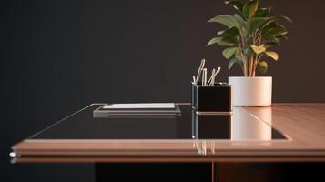 A desk with a plant and a pen on it photo