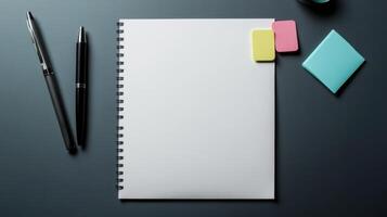 Blank notebook, pen, pencil, sticky notes and notepad on dark background photo