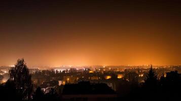 night cityscape with dim streetlights and glowing skyline photo