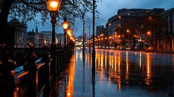 A wet street with lights on it photo
