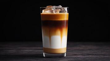 An iced coffee with ice and cream photo
