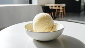 A bowl of ice cream sitting on a table photo