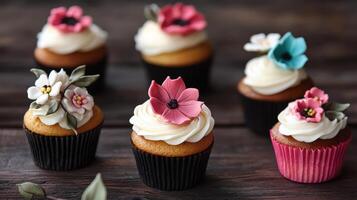 Cupcakes with flowers on top photo