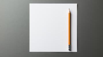 Blank paper with pencil on grey background photo