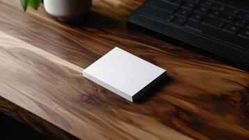 Minimalist blank business card on wooden desk photo