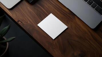blank business card on wooden desk, ideal for branding photo