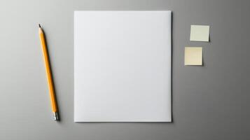 Blank paper, pencil and sticky notes on gray background photo