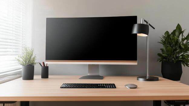 modern office desk with large monitor and keyboard photo