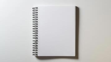 blank spiral notebook on minimalist background photo