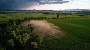 sudden microburst over farm creates strong winds and dust photo