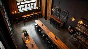 top down view of brewery taproom with wooden tables photo