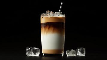 Iced coffee with ice cubes on a black background photo