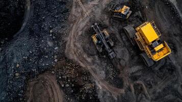 Aerial view of heavy machinery in mining site photo