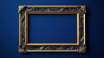 Gilded Baroque style picture frame on blue background photo