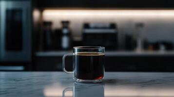 Black coffee in sleek glass mug on marble countertop photo