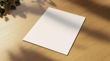 Blank white paper on wooden desk ready to write ideas photo