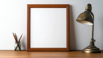 Classic wooden photo frame on desk with lamp
