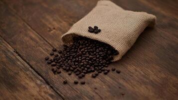 Coffee beans in a bag on a wooden table photo
