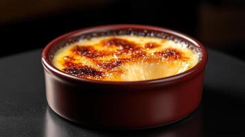 Creamy dessert with caramelized sugar crust, perfect indulgence photo