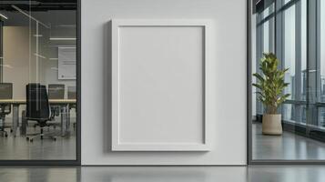 A white frame is sitting on the wall in an office photo