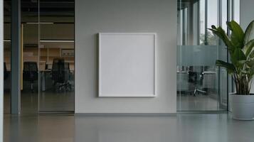 Blank frame in an office with plants photo