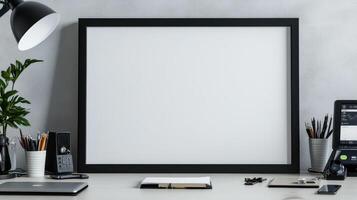 A desk with a black framed picture on it photo