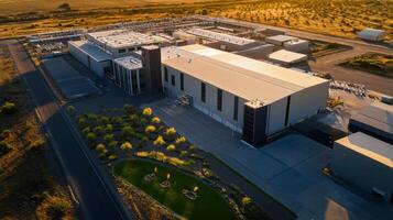 Aerial view of modern industrial facility with solar panels photo