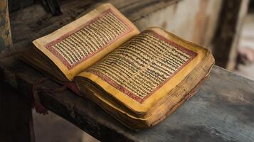 A close-up of an old Hindu religious scripture featuring intricate text and traditional bindings, symbolizing sacred wisdom and devotion. photo