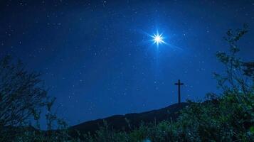 A Christian cross glowing under a shining star in the night sky, symbolizing divine guidance, hope, and the presence of God. photo