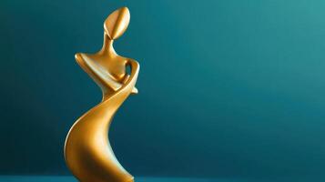 Abstract golden sculpture representing elegance and grace against a teal background in a modern art setting photo