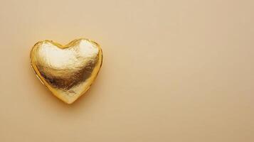 Golden heart-shaped object resting on a neutral background displaying elegance and charm, perfect for themes of love and affection, ideal for decorative purposes or gifts photo