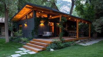 Modern Dark Exterior Home with Wooden Deck and String Lights Evening Ambiance photo