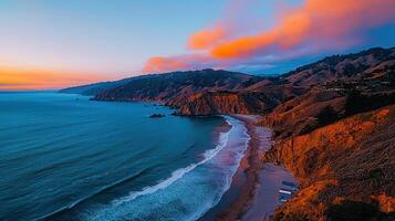 Stunning Sunset Coastal Landscape Dramatic Ocean Waves Crashing on Sandy Beach Cliffs Aerial View photo