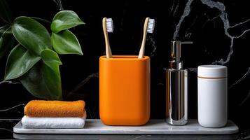 Modern Bathroom Essentials Orange Toothbrush Holder with Bamboo Toothbrushes Soap Dispenser and Container photo