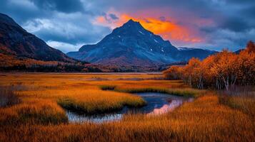 Majestic Mountain Landscape at Sunset Autumnal Colors Reflecting on Still Water Golden Grasslands Scenic View photo