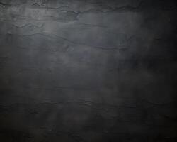 A textured dark background with subtle variations in tone and depth. photo