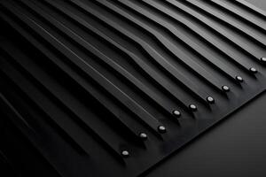 Black Textured Surface with Parallel Ridges and Circular Indentations photo