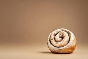 Cinnamon Roll on Tan Background photo