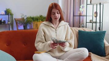 Rich woman counting money cash and use calculator app, calculate domestic income earnings at home video