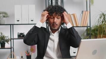Excited amazed indian businessman showing hands brain head explosion gesture Wow, brainstorm, idea video