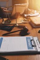 Contracts and legal documents on a desk photo