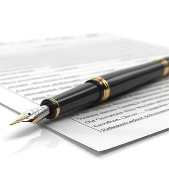 A elegant fountain pen rests on a sheet of paper, symbolizing professionalism and commitment. photo