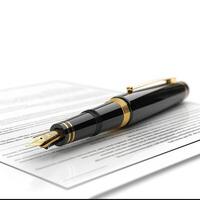 A sleek black fountain pen with gold accents rests atop important documents, symbolizing professionalism and elegance. photo