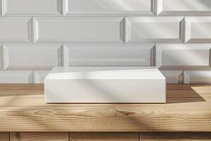 Minimalistic white box on a wooden table with textured wall in the background, creating a clean, modern aesthetic. photo
