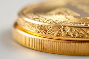 Close-up of a golden coin showcasing intricate engravings and a shiny finish. photo