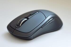 Close-up view of a sleek, modern wireless computer mouse in gray tones, showcasing its ergonomic design and precision. photo