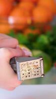 Hand Squeezing Out Minced, Crushed, Garlic Using A Small Garlic Pressing Tool. video