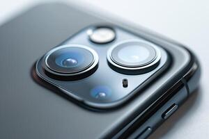Close-up of a sleek smartphone camera module, showcasing its dual lenses and modern design. photo