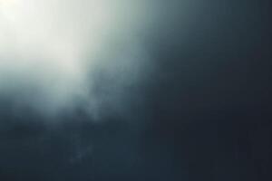A moody, abstract composition with soft, dark clouds creating an ethereal atmosphere. photo